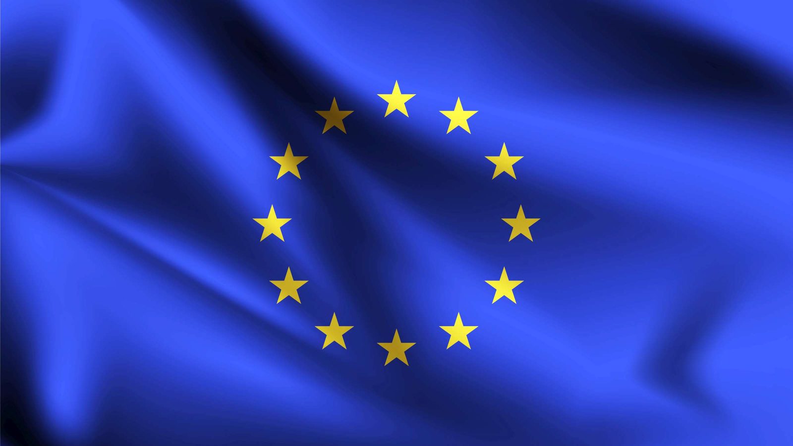 Wehende Europaflagge mit gelbem Sternenkranz auf blauem Grund
